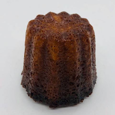 Close-up of gluten-free canelé